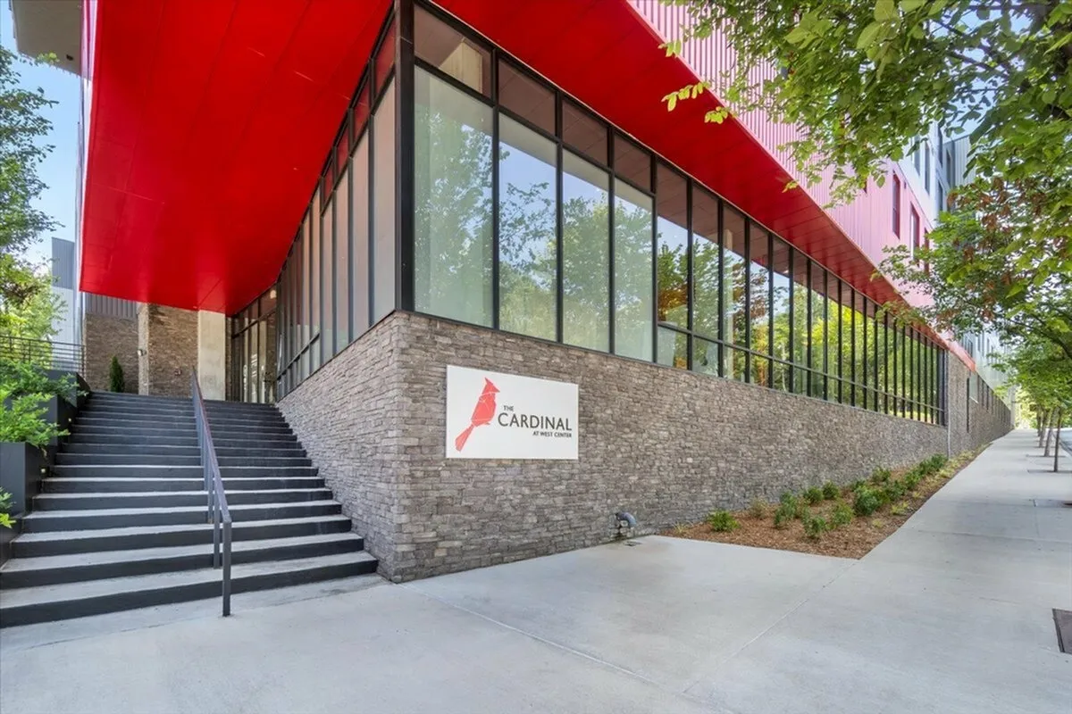 Modern building with red accents.